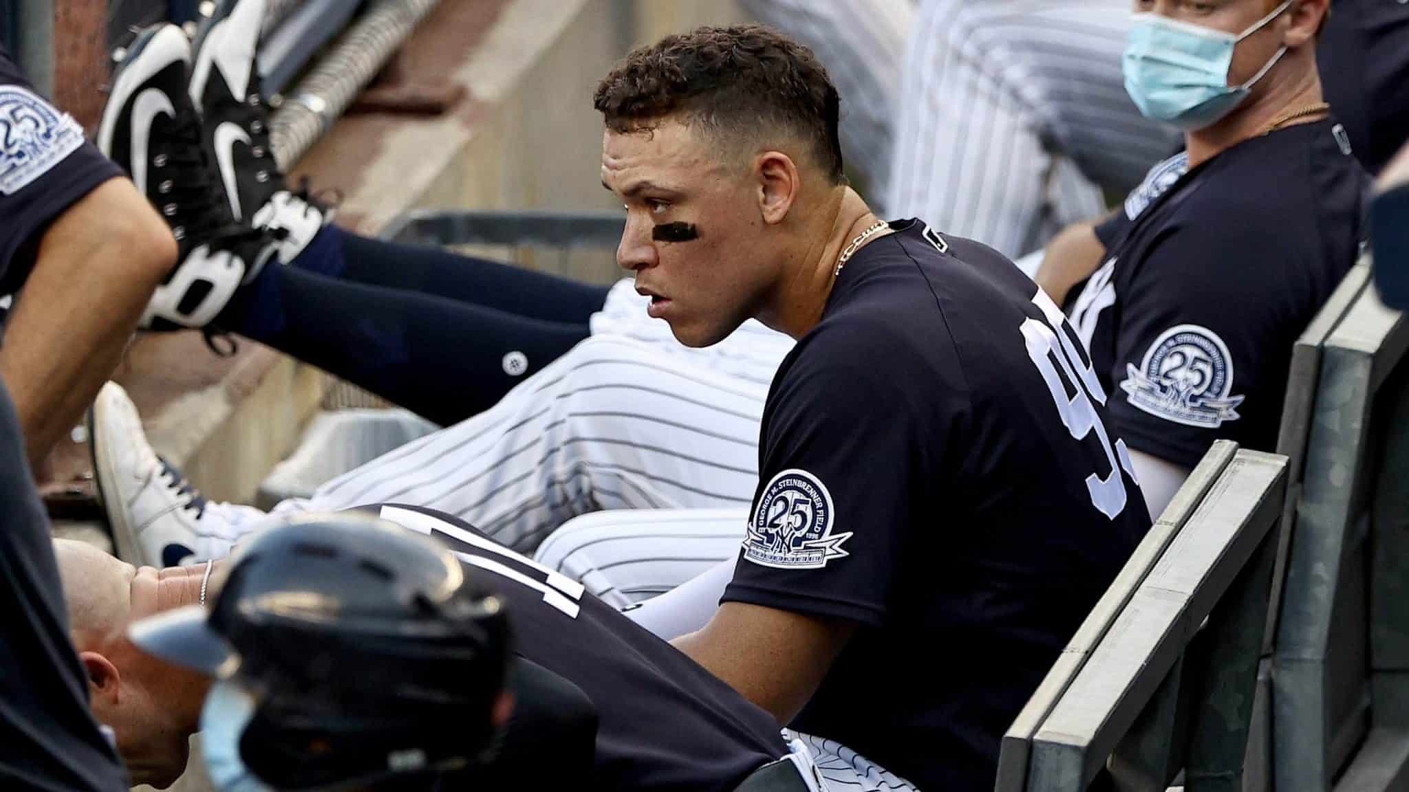 NEW YORK, NEW YORK - JULY 20: Aaron Judge #99 of the New York Yankees looks on from the dugout in the bottom of the first inning against the Philadelphia Phillies during a Summer Camp game at Yankee Stadium on July 20, 2020 in the Bronx borough of New York City.