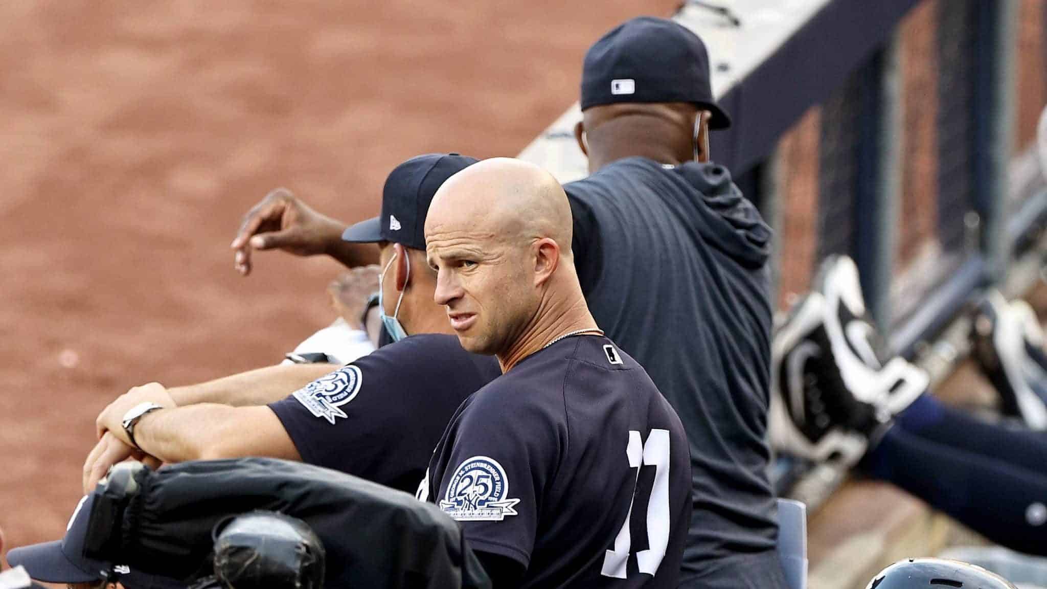 NEW YORK, NEW YORK - JULY 20: Brett Gardner #11 of the New York Yankees looks on from the dugout in the first inning against the Philadelphia Phillies during a Summer Camp game at Yankee Stadium on July 20, 2020 in the Bronx borough of New York City.