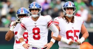 EAST RUTHERFORD, NEW JERSEY - NOVEMBER 10: Daniel Jones #8 and Nick Gates #65 of the New York Giants look on during the first half of their game against the New York Jets at MetLife Stadium on November 10, 2019 in East Rutherford, New Jersey.