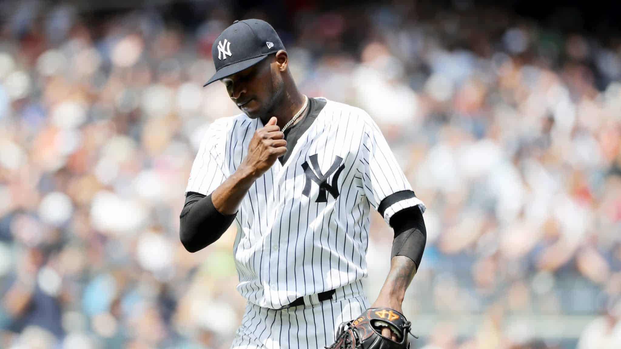 NEW YORK, NEW YORK - AUGUST 03: Domingo German #55 of the New York Yankees celebrates as he walks off the field in the fourth inning against the Boston Red Sox during game one of a double header at Yankee Stadium on August 03, 2019 in the Bronx borough of New York City.