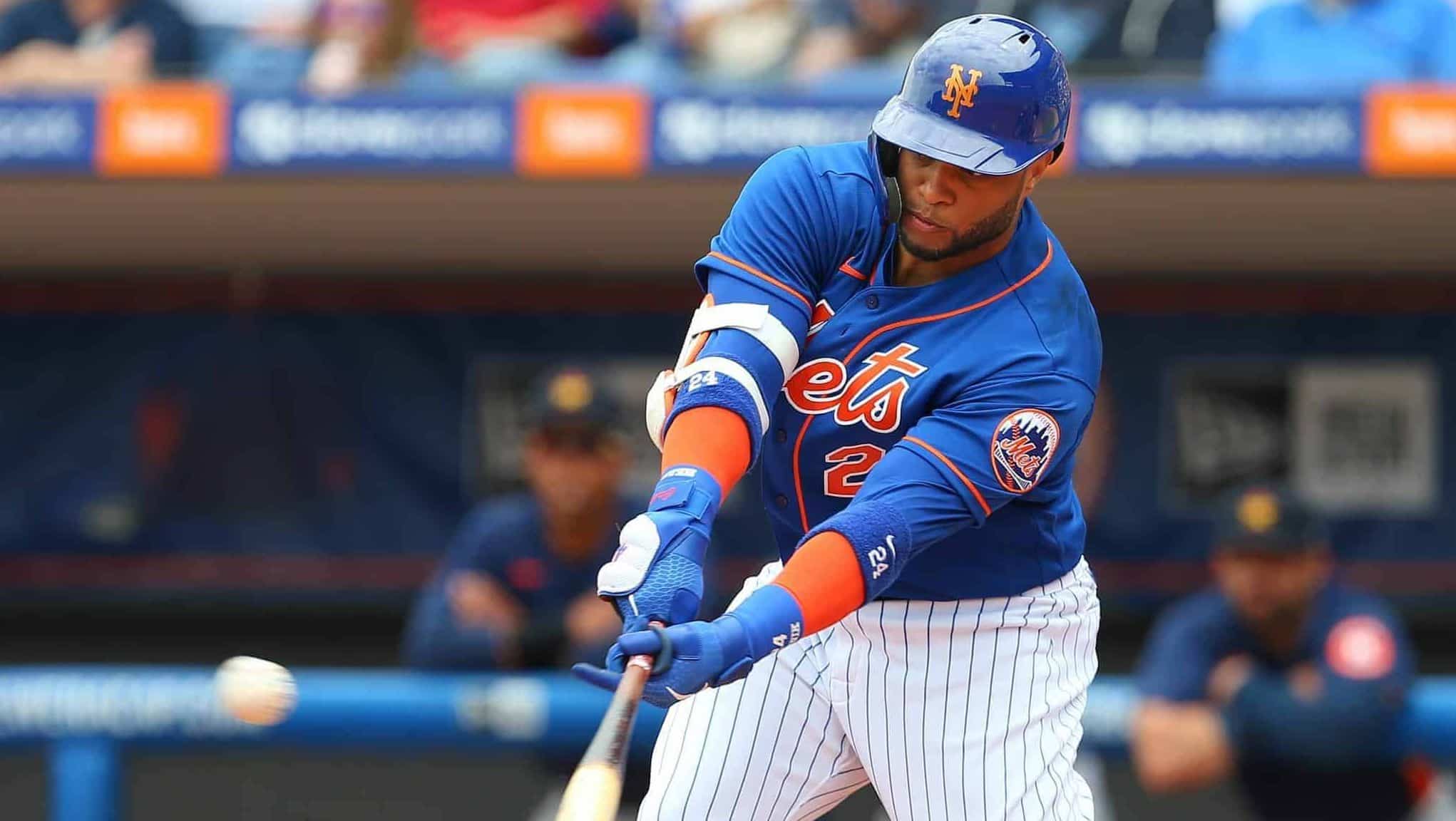 PORT ST. LUCIE, FL - MARCH 08: Robinson Cano #24 of the New York Mets hits a single against the Houston Astros during the first inning of a spring training baseball game at Clover Park on March 8, 2020 in Port St. Lucie, Florida. The Mets defeated the Astros 3-1.