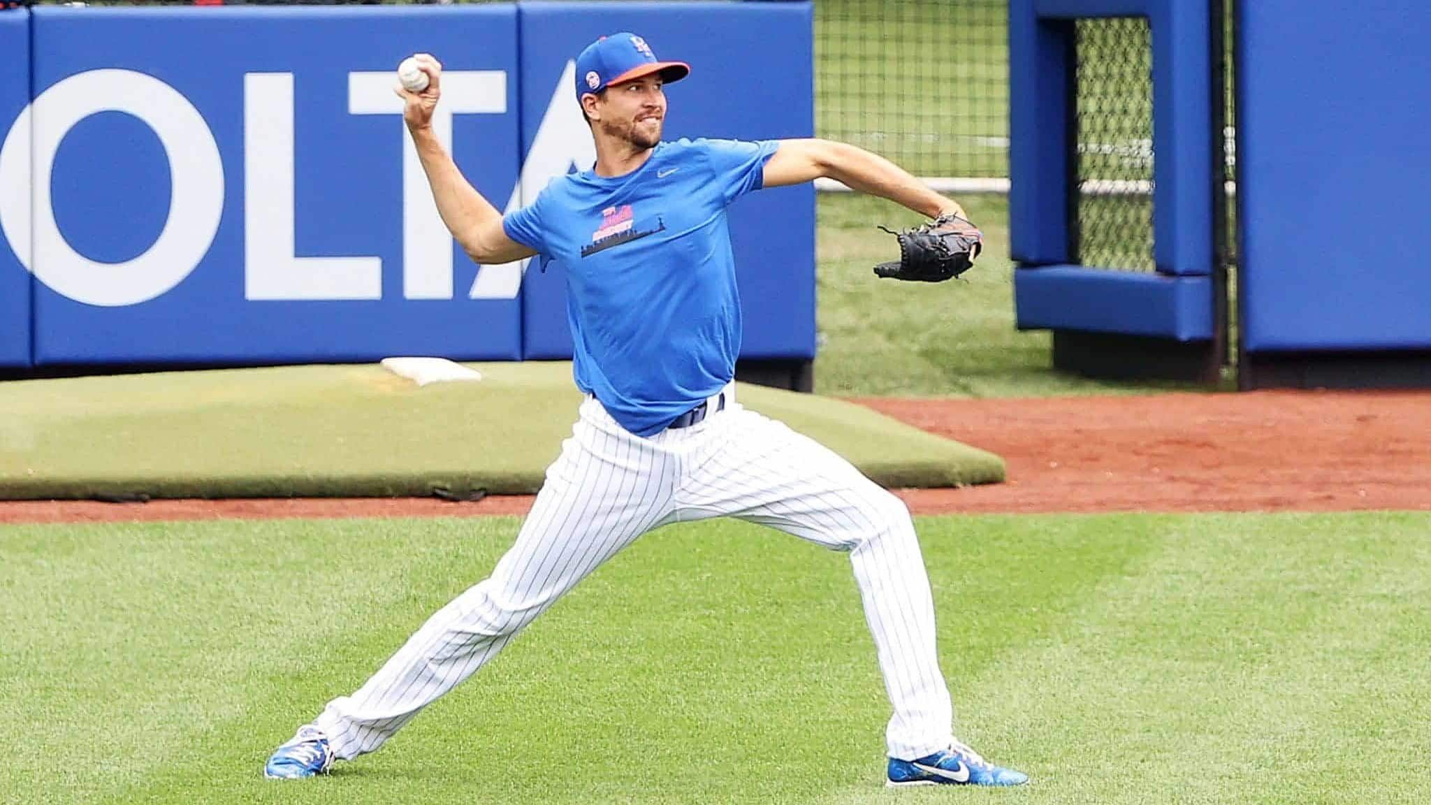 NEW YORK, NEW YORK - JULY 03: Jacob deGrom #48 of the New York Mets throws pitches in the outfield during Major League Baseball Summer Training restart at Citi Field on July 03, 2020 in New York City.