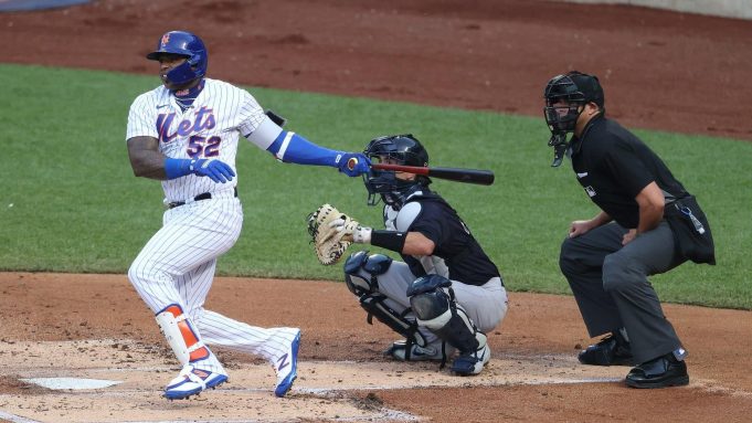 NEW YORK, NEW YORK - JULY 18: Yoenis Cespedes #52 of the New York Mets bats against the New York Yankees during their Pre Season game at Citi Field on July 18, 2020 in New York City.