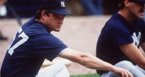 1991: NEW YORK PITCHER STEVE HOWE STRETCHES BEFORE THE YANKEES GAME VERSUS THE CHICAGO WHITE SOX AT COMISKEY PARK IN CHICAGO, ILLINOIS.