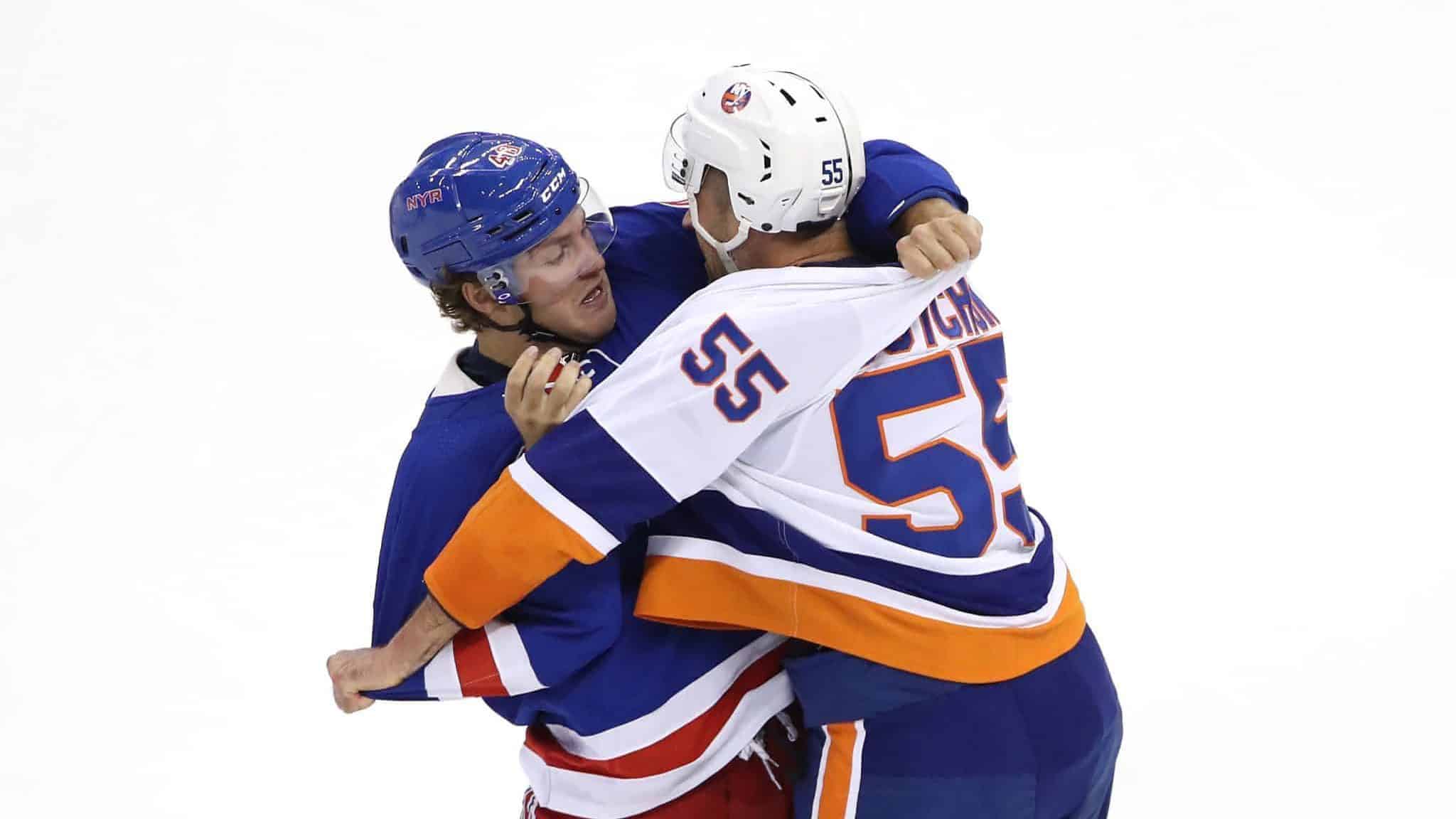 TORONTO, ONTARIO - JULY 29: Brendan Lemieux #48 of the New York Rangers and Johnny Boychuk #55 of the New York Islanders scuffle in the first period during an exhibition game prior to the 2020 NHL Stanley Cup Playoffs at Scotiabank Arena on July 29, 2020 in Toronto, Ontario.