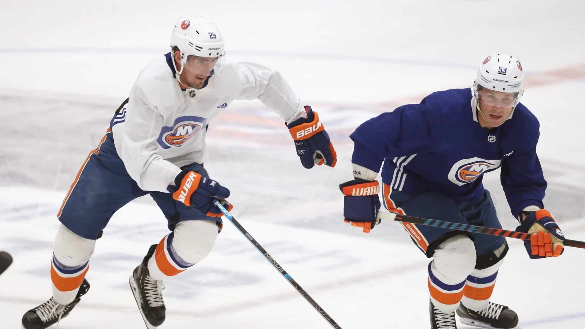 EAST MEADOW, NEW YORK - JULY 13: (L-R) Brock Nelson #29 and Casey Cizikas #53 of the New York Islanders skate in practice at the Northwell Health Ice Center on July 13, 2020 in East Meadow, New York. This is the first practice for the team since the NHL paused it's season due to the coronavirus pandemic.