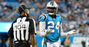 CHARLOTTE, NC - AUGUST 17: James Bradberry #24 of the Carolina Panthers talks with a referee between plays against the Miami Dolphins during the game at Bank of America Stadium on August 17, 2018 in Charlotte, North Carolina.