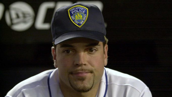 21 Sep 2001: Mike Piazza wearing his Port Authority Police hat in honor of the victims of the World Trade Center attacks before the Mets game against the Atlanta Braves at Shea Stadium in Flushing, New York .