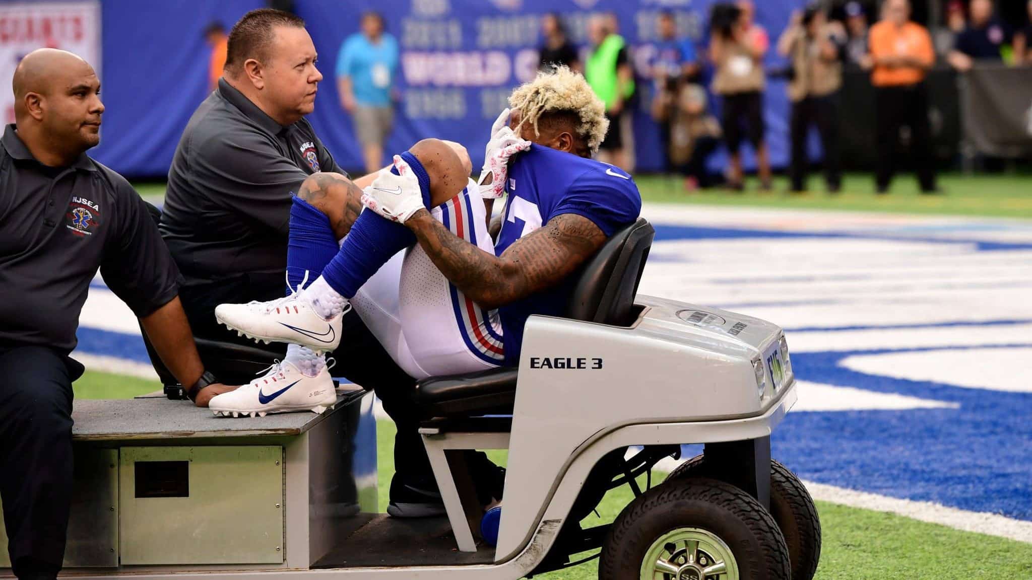 EAST RUTHERFORD, NJ - OCTOBER 08: Odell Beckham #13 of the New York Giants is carted off the field after sustaining an injury during the fourth quarter against the Los Angeles Chargers during an NFL game at MetLife Stadium on October 8, 2017 in East Rutherford, New Jersey. The Los Angeles Chargers defeated the New York Giants 27-22.