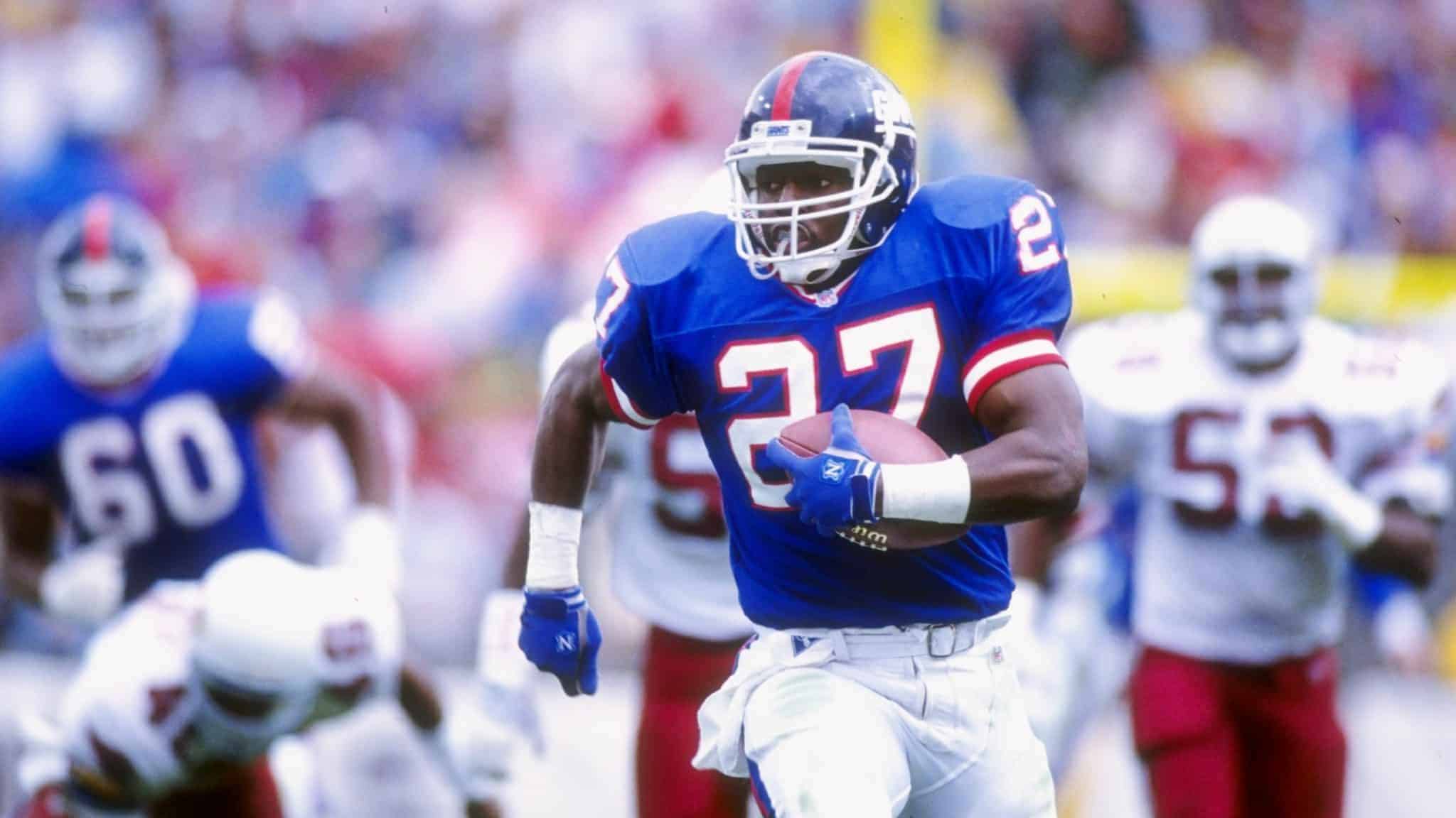 10 Nov 1991: Running back Rodney Hampton of the New York Giants runs with the ball during a game against the Phoenix Cardinals at Sun Devil Stadium in Tempe, Arizona. The Giants won the game 21-14.