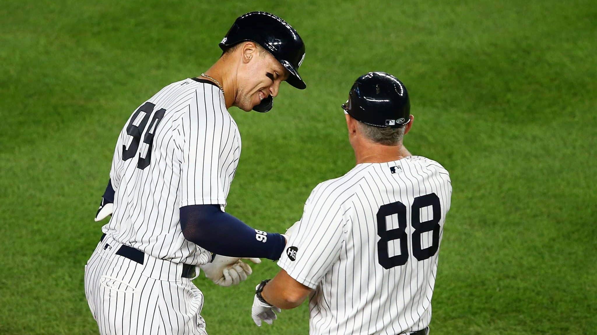 NEW YORK, NEW YORK - AUGUST 02: Aaron Judge #99 of the New York Yankees celebrates after hitting a 2-run home run in the bottom of the eighth inning against the Boston Red Sox at Yankee Stadium on August 02, 2020 in New York City.
