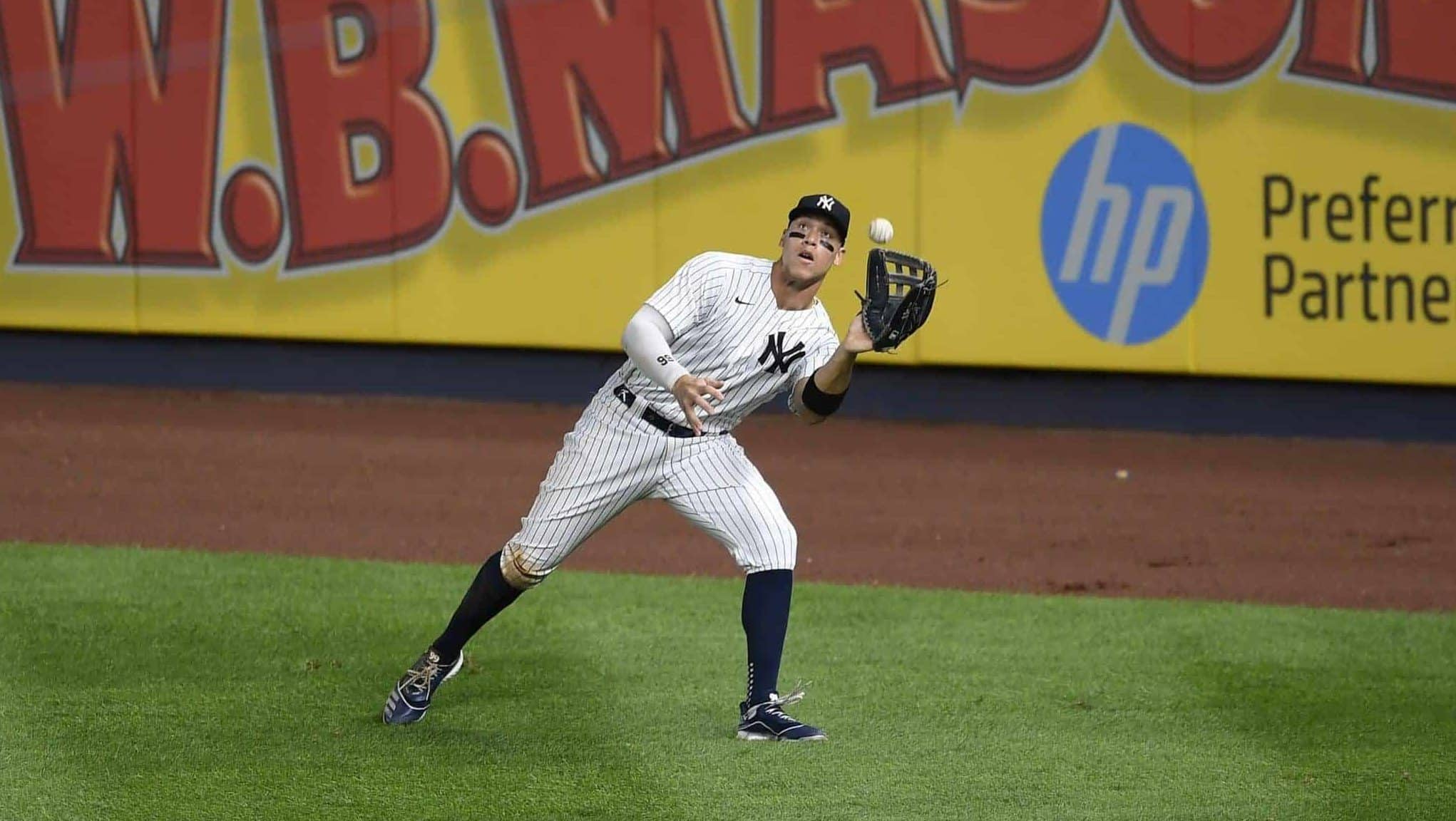 NEW YORK, NEW YORK - AUGUST 03: Aaron Judge #99 of the New York Yankees makes an out on a fly ball in the right field during the fifth inning against the Philadelphia Phillies at Yankee Stadium on August 03, 2020 in the Bronx borough of New York City.
