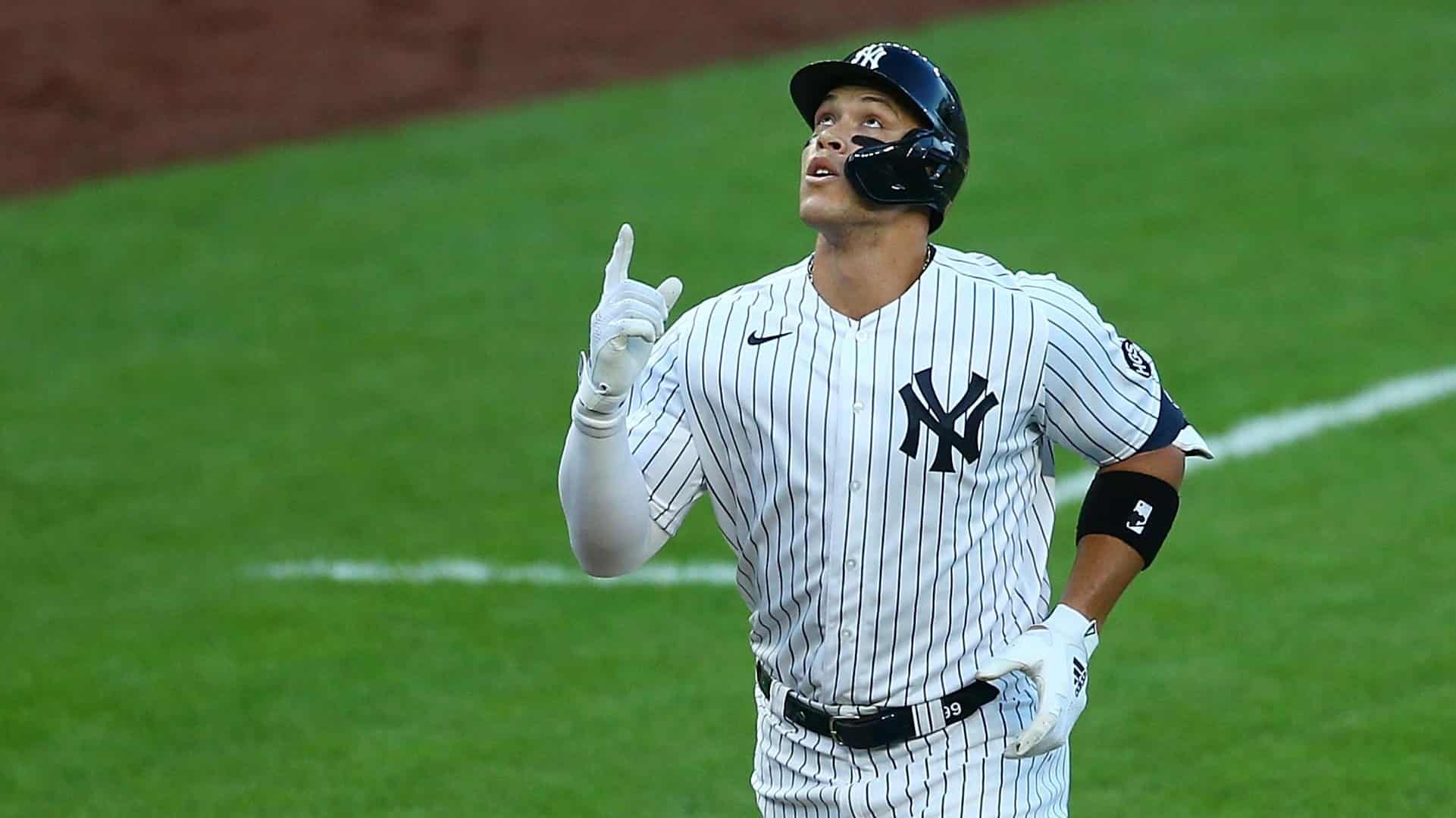 NEW YORK, NEW YORK - AUGUST 01: Aaron Judge #99 of the New York Yankees points to the sky after hitting a first inning home run against the Boston Red Sox at Yankee Stadium on August 01, 2020 in New York City.