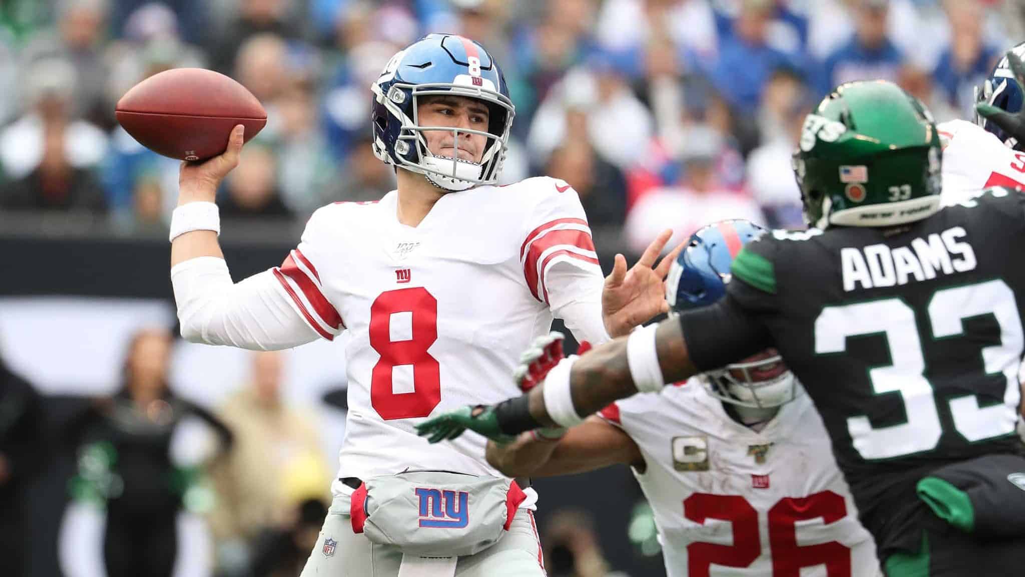 EAST RUTHERFORD, NEW JERSEY - NOVEMBER 10: Daniel Jones #8 of the New York Giants passes against the New York Jets during their game at MetLife Stadium on November 10, 2019 in East Rutherford, New Jersey.
