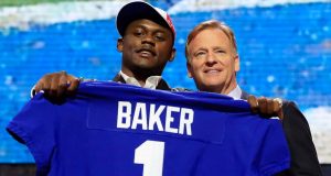 NASHVILLE, TENNESSEE - APRIL 25: Deandre Baker of Georgia poses with NFL Commissioner Roger Goodell after being chosen #30 overall by the New York Giants during the first round of the 2019 NFL Draft on April 25, 2019 in Nashville, Tennessee.