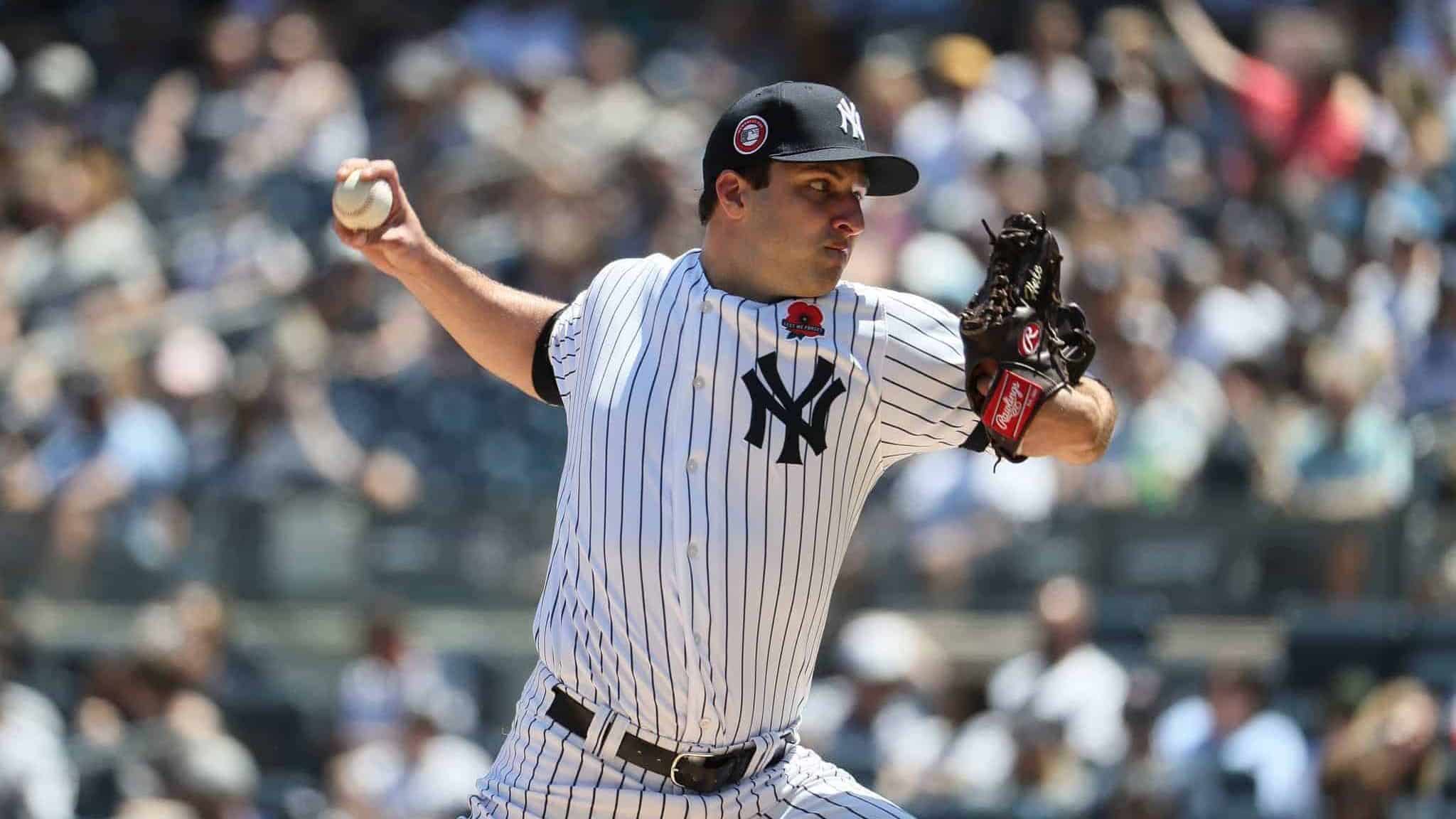 NEW YORK, NEW YORK - MAY 27: David Hale #75 of the New York Yankees pitches against the San Diego Padres during their game at Yankee Stadium on May 27, 2019 in New York City.