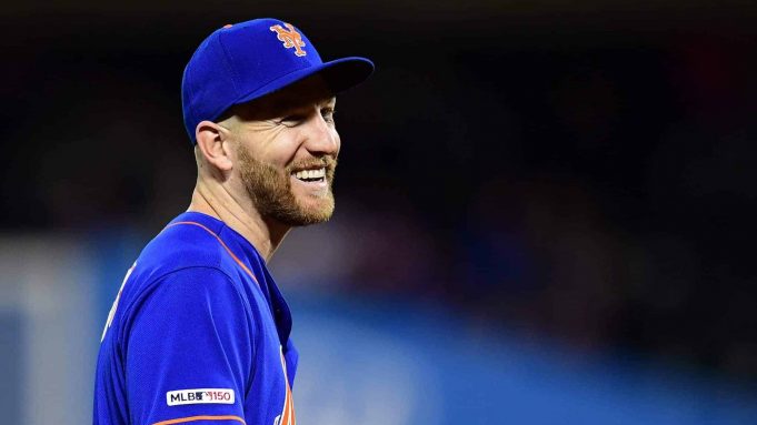 NEW YORK, NEW YORK - SEPTEMBER 27: Todd Frazier #21 of the New York Mets smiles in the seventh inning of their game against the Atlanta Braves at Citi Field on September 27, 2019 in the Flushing neighborhood of the Queens borough of New York City.