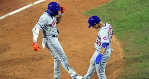 PHILADELPHIA, PA - AUGUST 15: Dominic Smith #2 of the New York Mets celebrates with Michael Conforto #30 after hitting a two-run home run in the ninth inning during a game against the Philadelphia Phillies at Citizens Bank Park on August 15, 2020 in Philadelphia, Pennsylvania. The Phillies won 6-2.