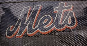 NEW YORK - JUNE 13: The Mets team logo is displayed at Shea Stadium, home of the New York Mets baseball team, June 13, 2005 in the Queens borough of New York City. In the latest attempt for New York to salvage the 2012 Olympic bid for the city, Mayor Michael Bloomberg has committed to a plan that would help the Mets build a new stadium that could be converted for use in the Olympics if New York were to win their bid. The new stadium, which would be built adjacent to the current Shea Stadium. Steve Cohen