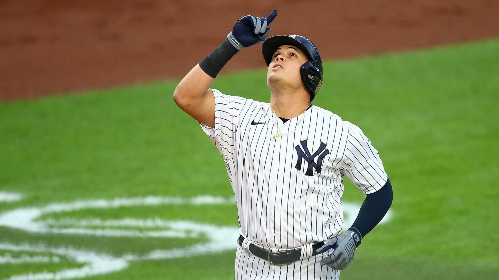 NEW YORK, NEW YORK - AUGUST 15: Gio Urshela #29 of the New York Yankees celebrates after hitting a 2-run home run in the first inning against the Boston Red Sox at Yankee Stadium on August 15, 2020 in New York City.