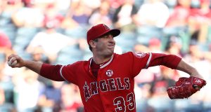 ANAHEIM, CALIFORNIA - JULY 13: Pitcher Matt Harvey #33 of the Los Angeles Angels of Anaheim pitches in the first innning of the MLB game against the Seattle Mariners at Angel Stadium of Anaheim on July 13, 2019 in Anaheim, California.