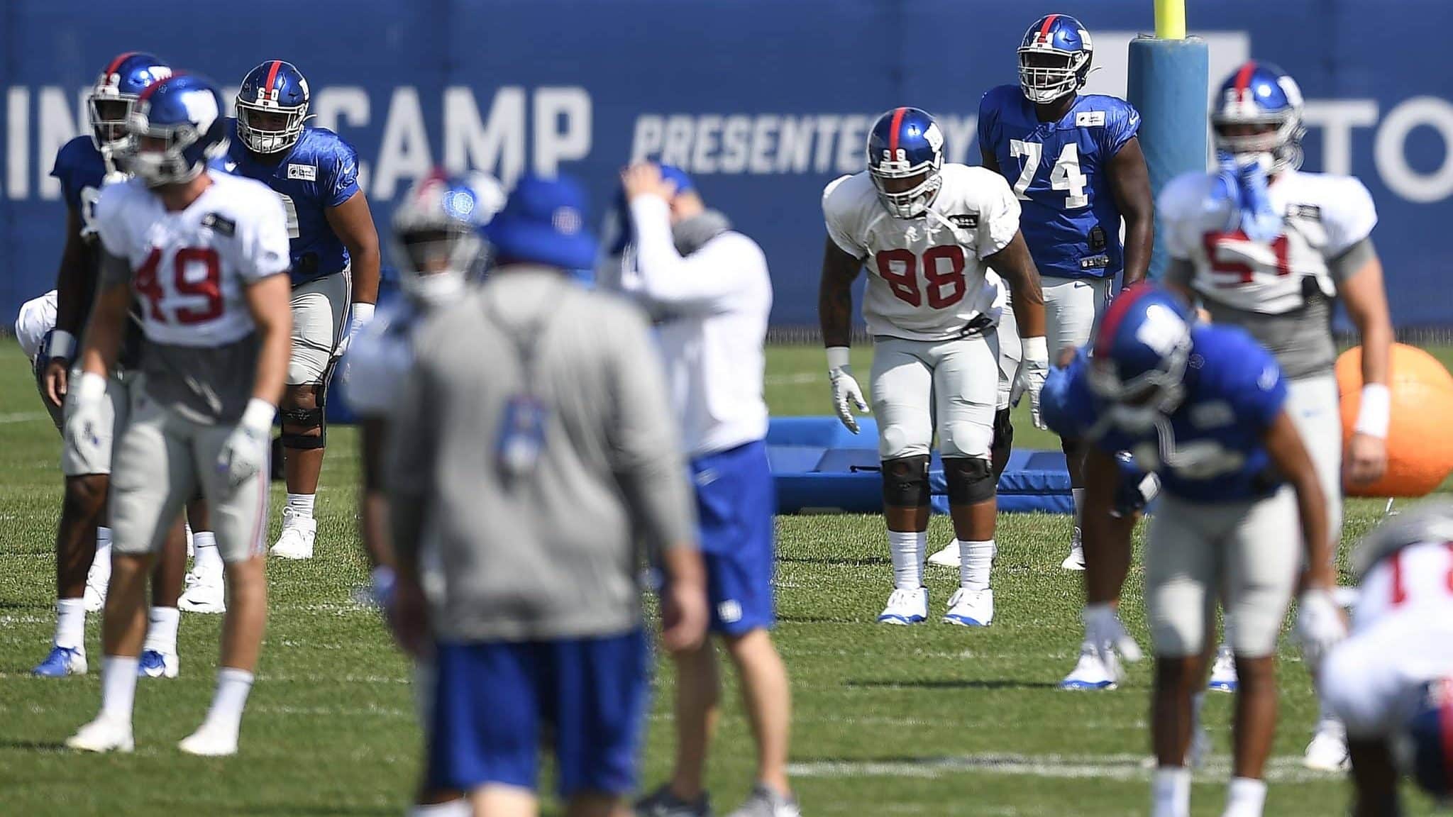 EAST RUTHERFORD, NEW JERSEY - AUGUST 21: Matt Peart #74 of the New York Giants looks on while stretching during training camp at NY Giants Quest Diagnostics Training Center on August 21, 2020 in East Rutherford, New Jersey.