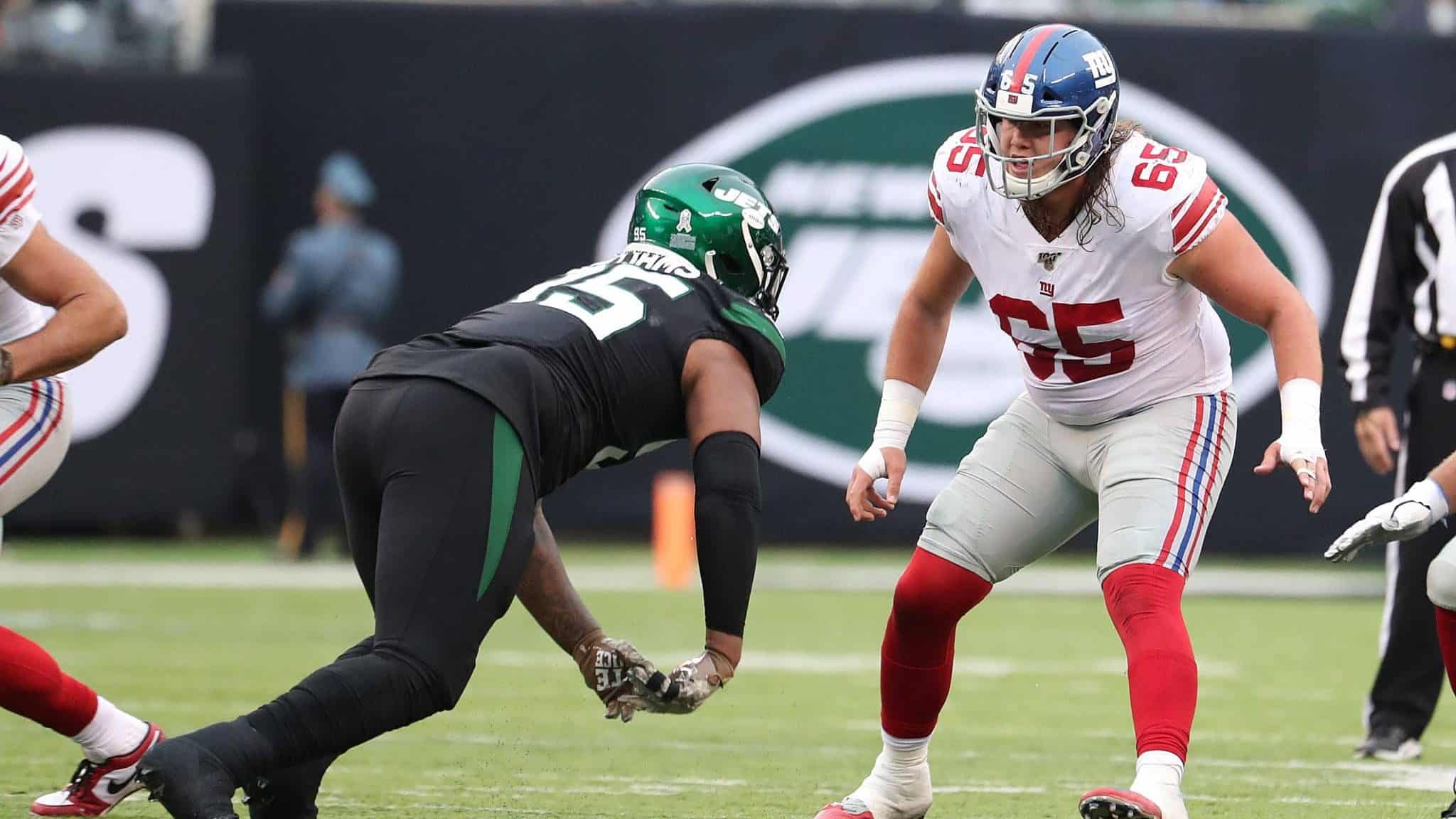 EAST RUTHERFORD, NEW JERSEY - NOVEMBER 10: Nick Gates #65 of the New York Giants in action against the New York Jsets during their game at MetLife Stadium on November 10, 2019 in East Rutherford, New Jersey.