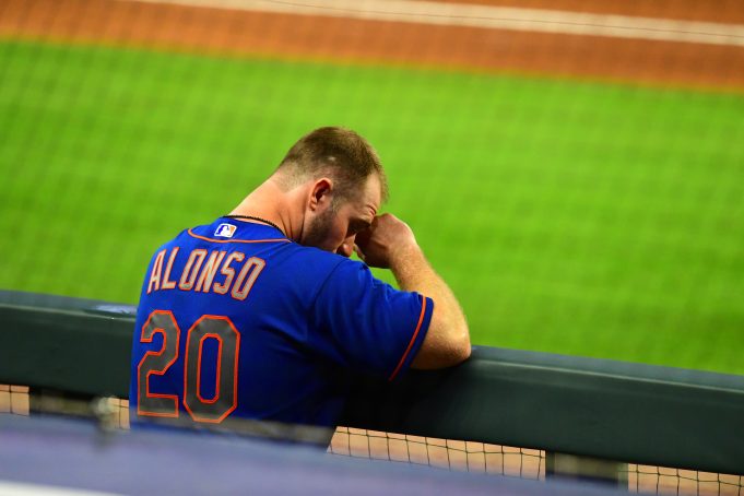 ATLANTA, GA - JULY 31: Pete Alonso #20 of the New York Mets watches play in the ninth inning against the Atlanta Braves at SunTrust Field on June 31, 2020 in Atlanta, Georgia.