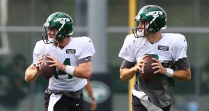 FLORHAM PARK, NEW JERSEY - AUGUST 23: Sam Darnold #14 and Mike White #8 of the New York Jets run drills at Atlantic Health Jets Training Center on August 23, 2020 in Florham Park, New Jersey.