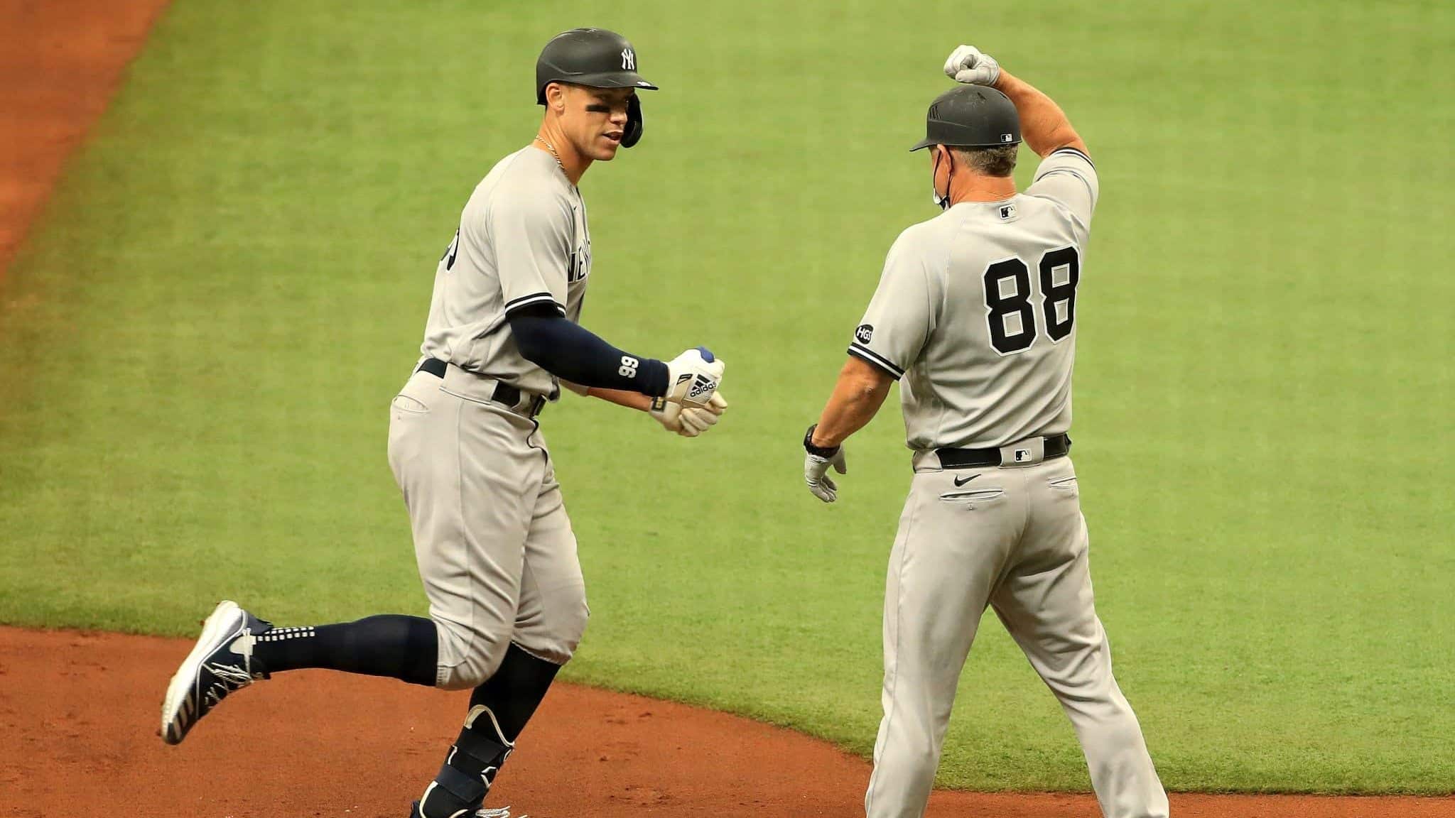 ST PETERSBURG, FLORIDA - AUGUST 08: Aaron Judge #99 of the New York Yankees hits a solo home run in the sixth inning during Game 1 of a doubleheader against the Tampa Bay Rays at Tropicana Field on August 08, 2020 in St Petersburg, Florida.