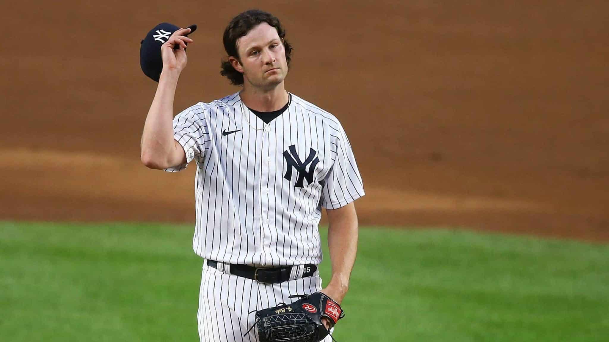 NEW YORK, NEW YORK - AUGUST 31: Gerrit Cole #45 of the New York Yankees reacts in the first inning against the Tampa Bay Rays at Yankee Stadium on August 31, 2020 in New York City.