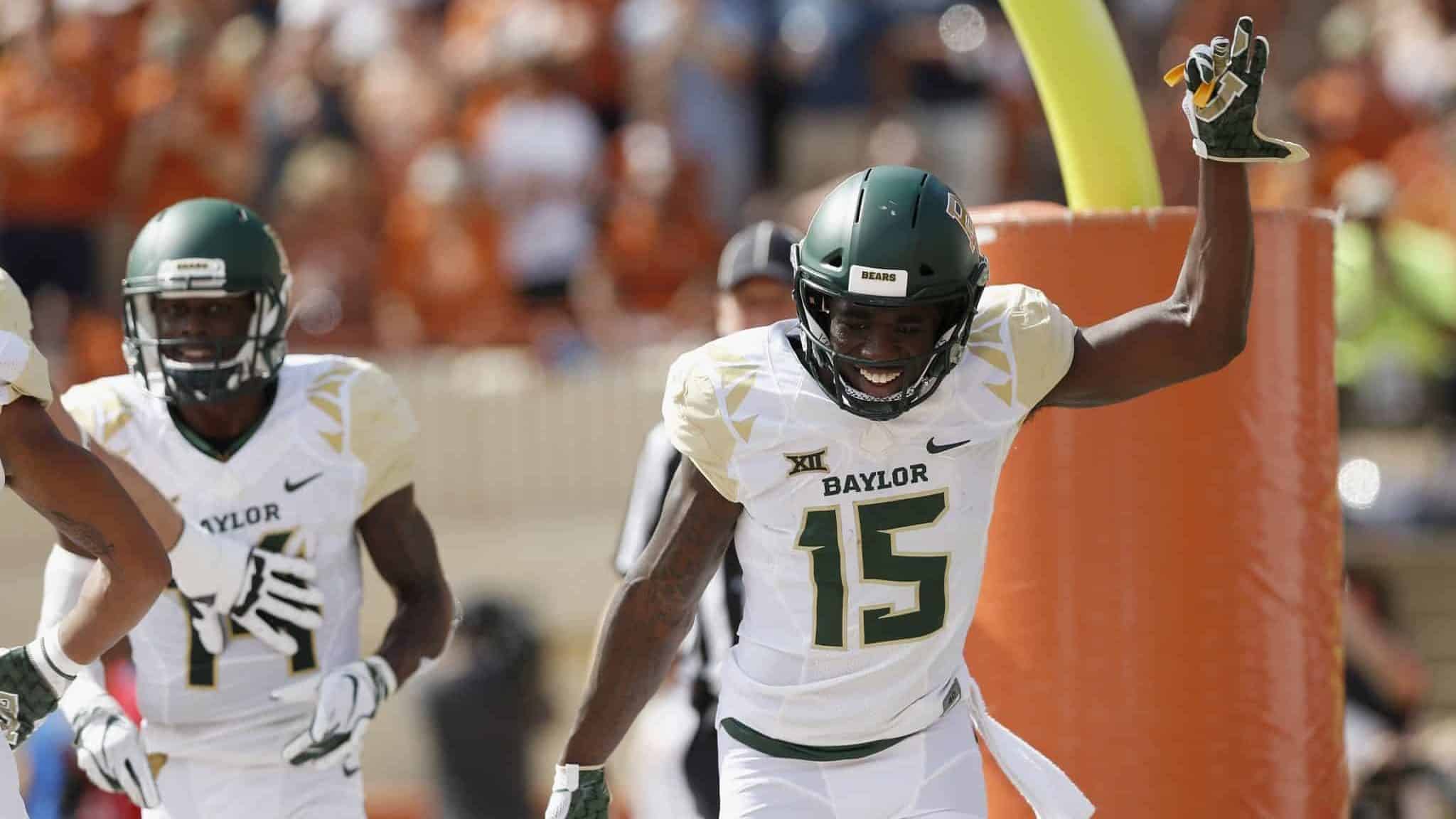 AUSTIN, TX - OCTOBER 13: Denzel Mims #15 of the Baylor Bears celebrates after a touchdown reception in the first half against the Texas Longhorns of the Baylor Bears at Darrell K Royal-Texas Memorial Stadium on October 13, 2018 in Austin, Texas.