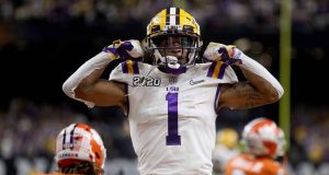 NEW ORLEANS, LOUISIANA - JANUARY 13: Ja'Marr Chase #1 of the LSU Tigers reacts to a touchdown during the first half against the Clemson Tigers in the College Football Playoff National Championship game at Mercedes Benz Superdome on January 13, 2020 in New Orleans, Louisiana.