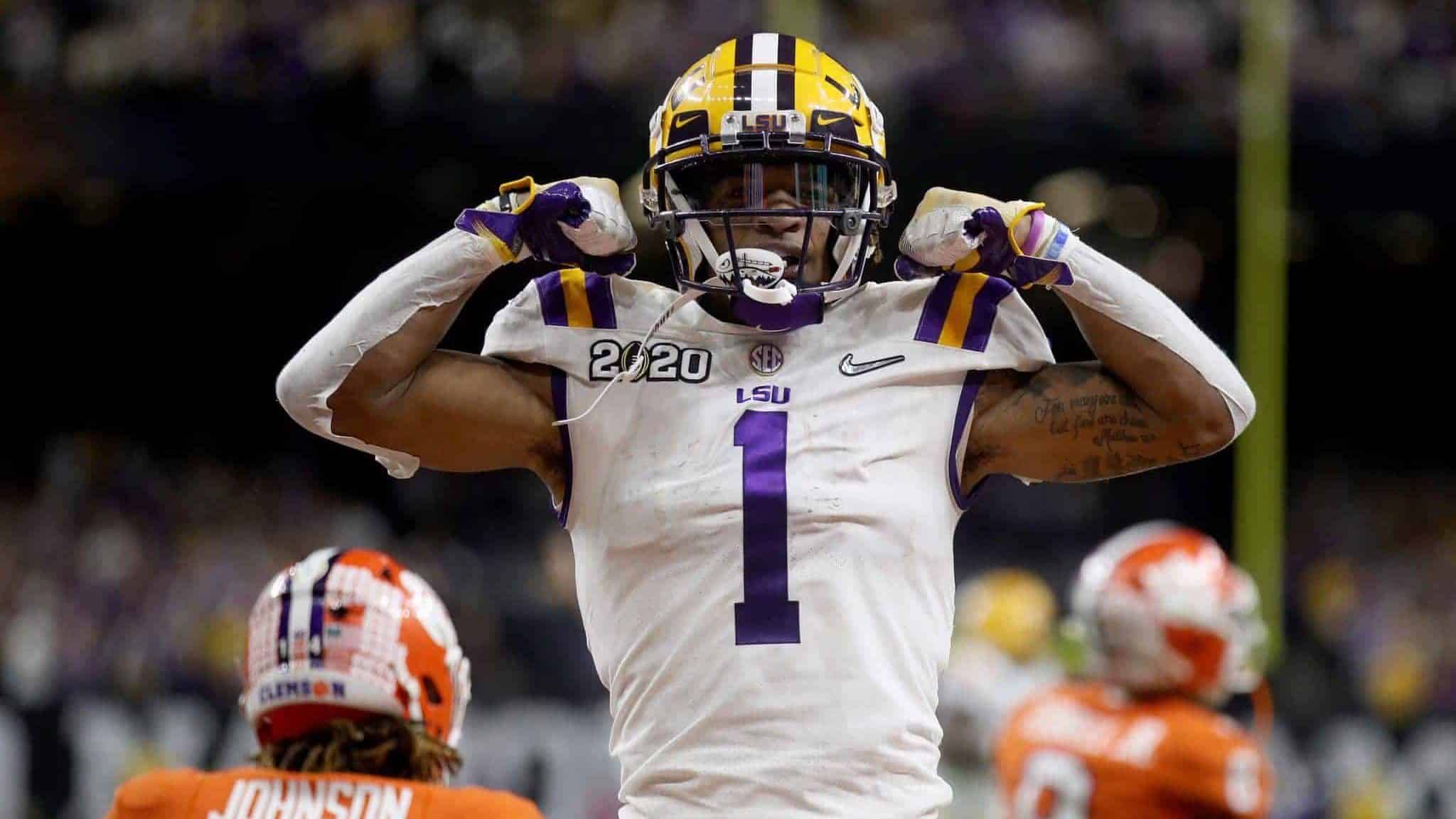 NEW ORLEANS, LOUISIANA - JANUARY 13: Ja'Marr Chase #1 of the LSU Tigers reacts to a touchdown during the first half against the Clemson Tigers in the College Football Playoff National Championship game at Mercedes Benz Superdome on January 13, 2020 in New Orleans, Louisiana.