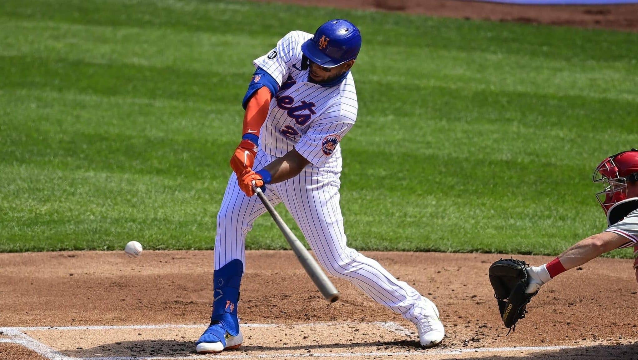 NEW YORK, NEW YORK - SEPTEMBER 06: Dominic Smith #2 of the New York Mets hits an RBI double against the Philadelphia Phillies during the first inning at Citi Field on September 06, 2020 in New York City.