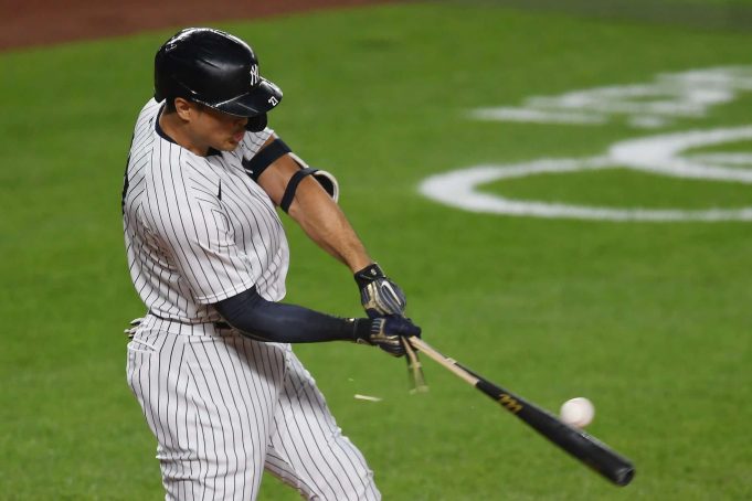 NEW YORK, NEW YORK - SEPTEMBER 15: Giancarlo Stanton #27 of the New York Yankees breaks his bat as he grounds out during the second inning against the Toronto Blue Jays at Yankee Stadium on September 15, 2020 in the Bronx borough of New York City.