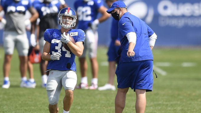 EAST RUTHERFORD, NEW JERSEY - AUGUST 21: Head coach Joe Judge of the New York Giants directs Sandro Platzgummer #34 during a drill during training camp at NY Giants Quest Diagnostics Training Center on August 21, 2020 in East Rutherford, New Jersey.