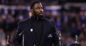 EAST RUTHERFORD, NJ - NOVEMBER 14: 2016 Giants Ring of Honor Inductee Justin Tuck speaks during the halftime ceremony of the game between the Cincinnati Bengals and the New York Giants at MetLife Stadium on November 14, 2016 in East Rutherford, New Jersey.