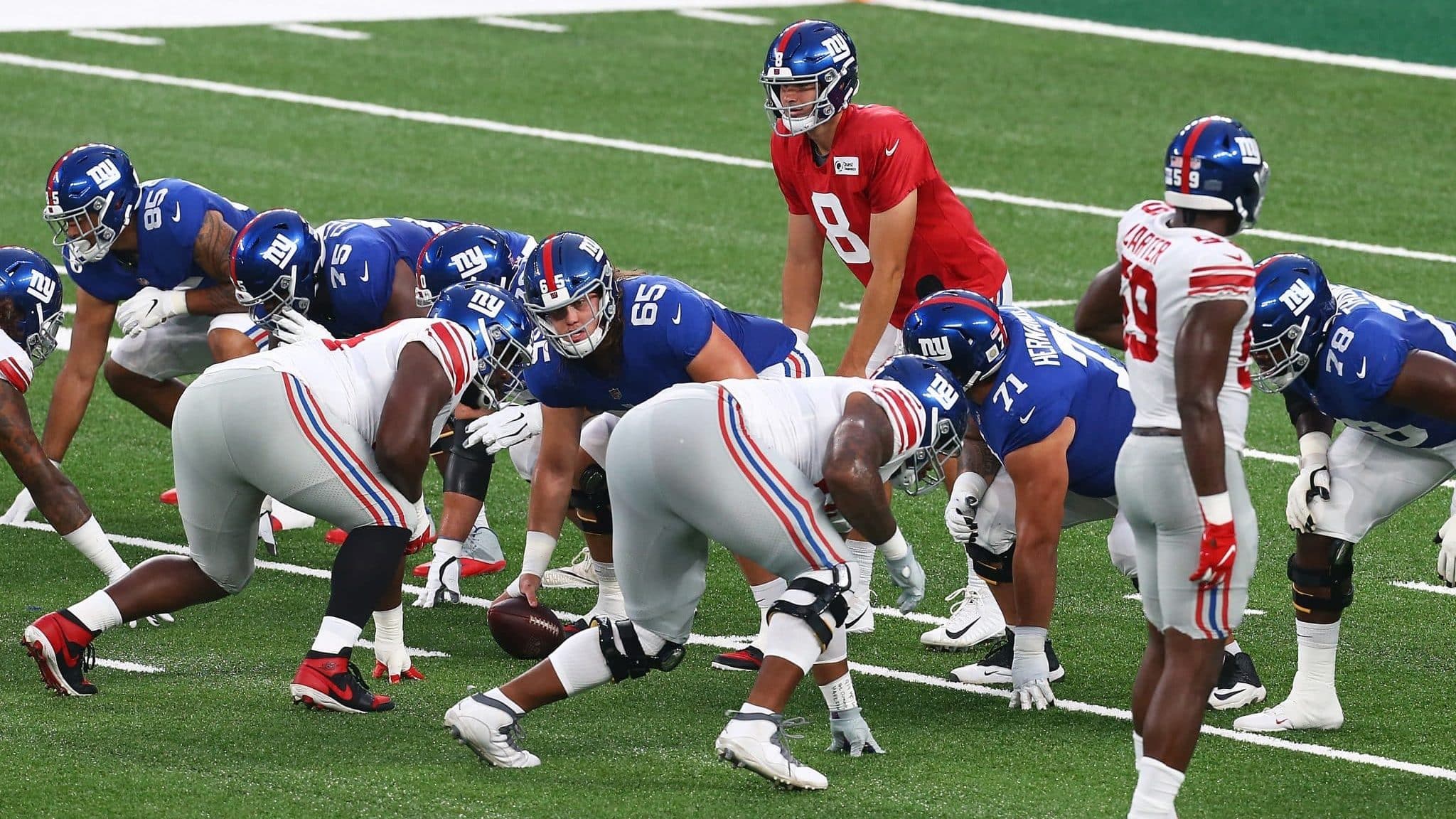 EAST RUTHERFORD, NEW JERSEY - AUGUST 28: Daniel Jones #8 of the New York Giants looks to pass the ball during the Blue and White scrimmage at MetLife Stadium on August 28, 2020 in East Rutherford, New Jersey.