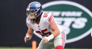 EAST RUTHERFORD, NEW JERSEY - NOVEMBER 10: Nick Gates #65 of the New York Giants in action against the New York Jets during their game at MetLife Stadium on November 10, 2019 in East Rutherford, New Jersey.