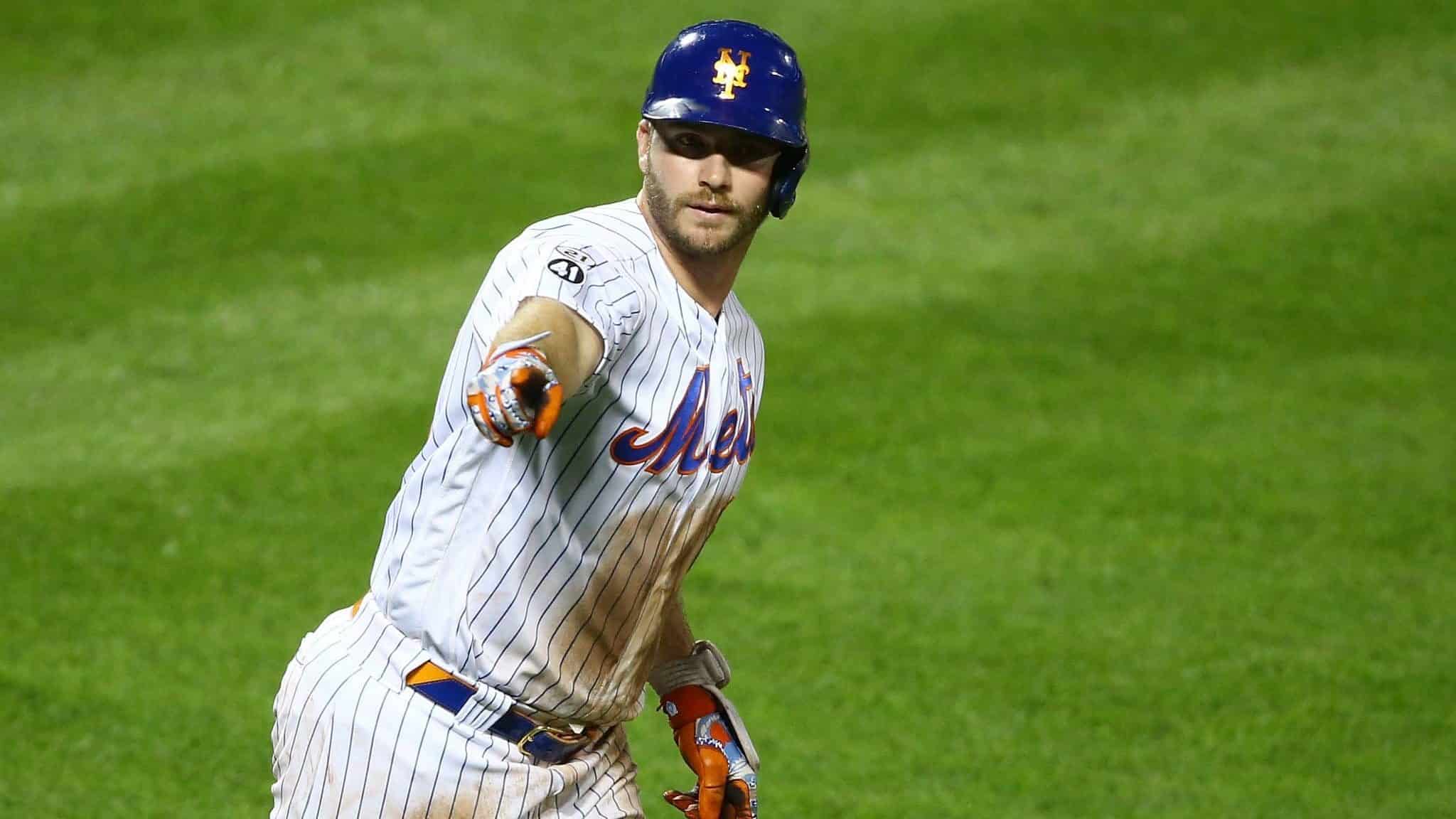 NEW YORK, NEW YORK - SEPTEMBER 09: Pete Alonso #20 of the New York Mets points to the bench after hitting a home run in the eighth inning against the Baltimore Orioles at Citi Field on September 09, 2020 in New York City.