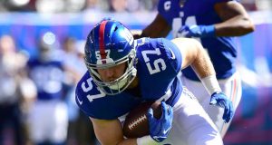 EAST RUTHERFORD, NEW JERSEY - SEPTEMBER 29: Ryan Connelly #57 of the New York Giants carries the ball during their game against the Washington Redskins at MetLife Stadium on September 29, 2019 in East Rutherford, New Jersey.