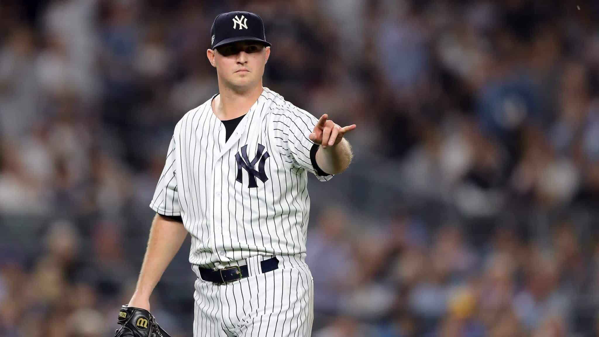 NEW YORK, NEW YORK - OCTOBER 09: Zach Britton #53 of the New York Yankees reacts in the fourth inning against the Boston Red Sox during Game Four American League Division Series at Yankee Stadium on October 09, 2018 in the Bronx borough of New York City.