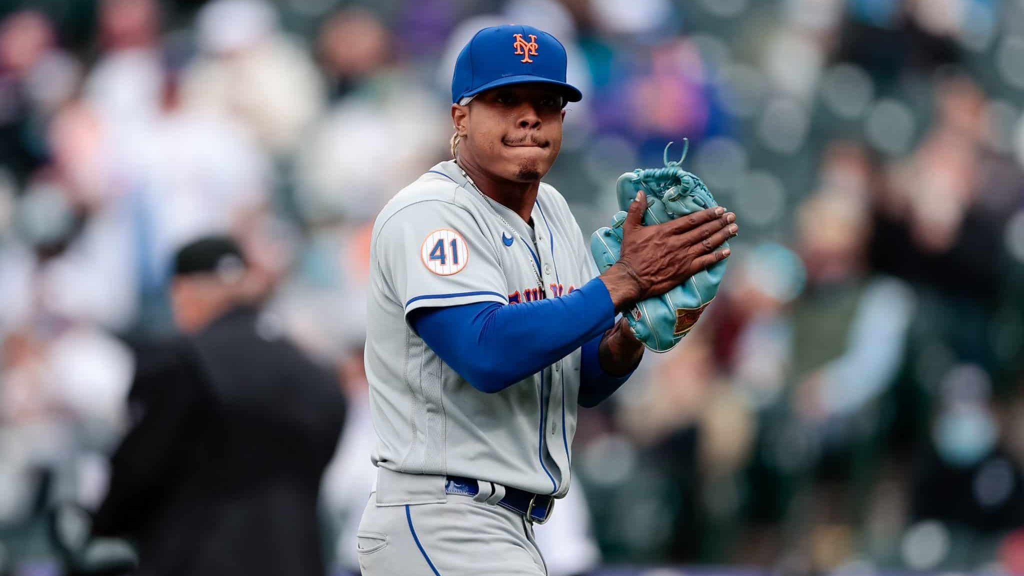 Apr 18, 2021; Denver, Colorado, USA; New York Mets starting pitcher Marcus Stroman (0) reacts at the end of the eighth inning against the Colorado Rockies at Coors Field.